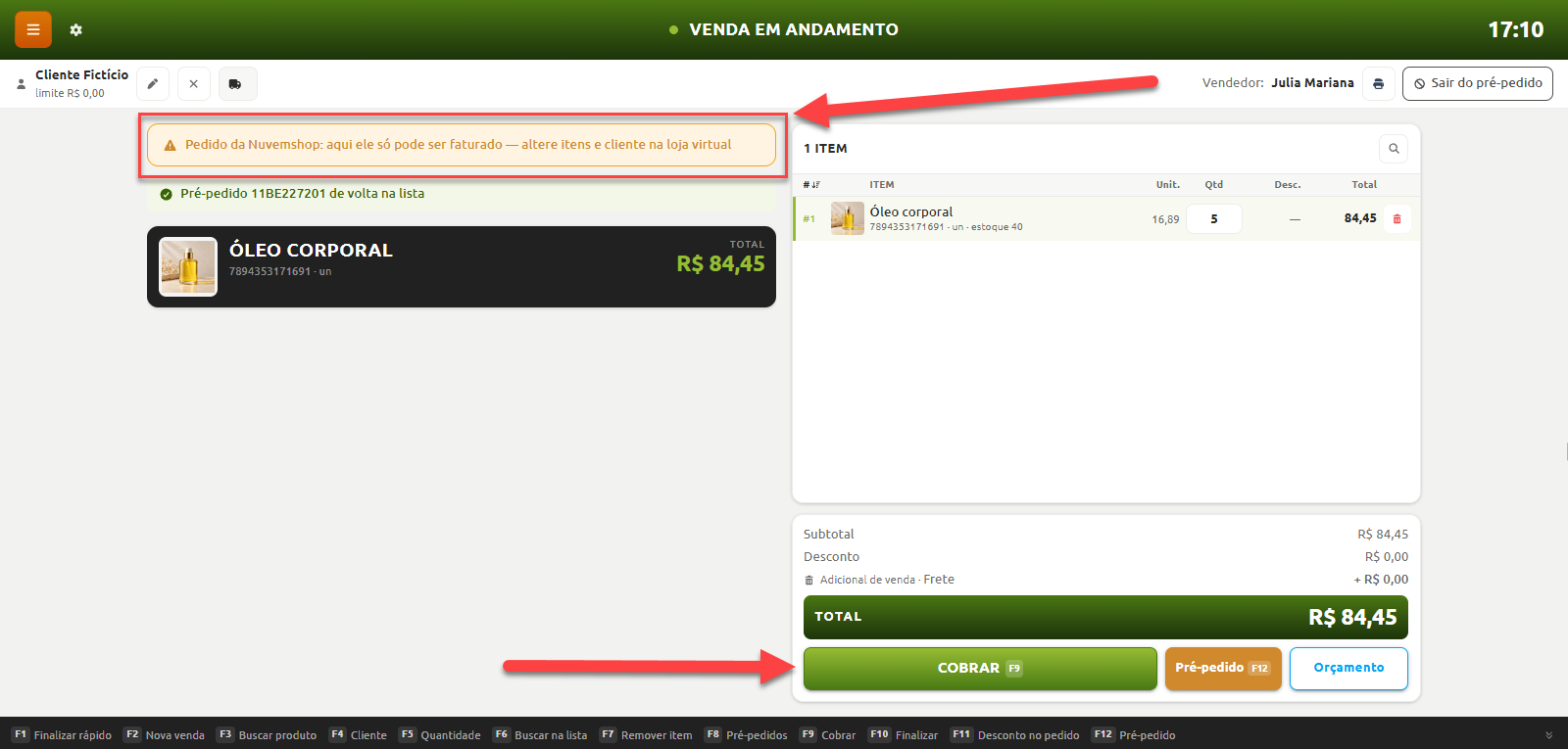 Tela de venda em andamento no sistema de caixa, destacando o aviso "Pedido da Nuvemshop: aqui ele só pode ser faturado — altere itens e cliente na loja virtual" e o botão "COBRAR F9" para finalizar o pagamento.